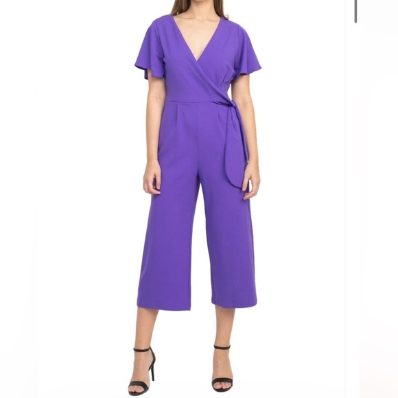 TARAHI ASL V NECK SHORT SLEEVE TIE SIDE SOLID WOVEN GAUCHO JUMPSUIT W/ POCKETS - Picture 1 of 12